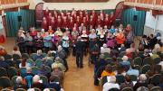 Anthony Marks conducting both choirs