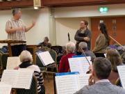 Tom talking to the soloists, Edward Robinson and Daniella Sicari